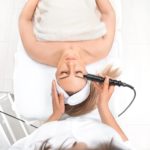 Personalised 3D treatment - woman getting a facial treatment